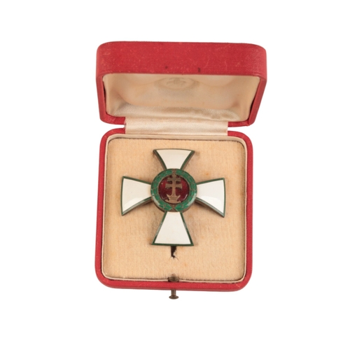 97 - A HUNGARIAN ORDER OF MERIT OFFICERS CROSS

silver gilt with enamel, with pin and catch to the revers... 