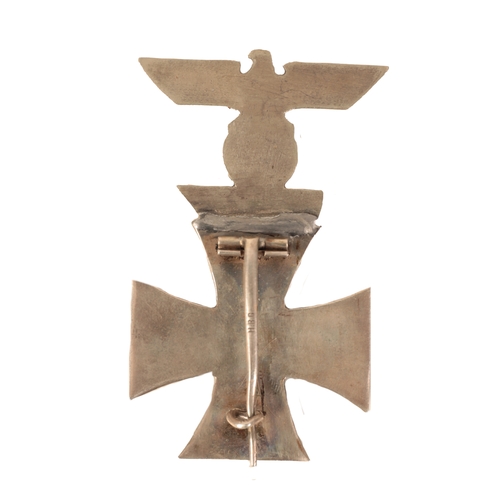 46 - A 1914 IRON CROSS WITH 2ND AWARD BAR 1939

three-piece construction, the pin and catch are present o... 