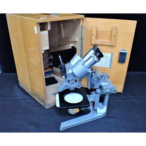 122 - A MICROSCOPE BY REICHERT, AUSTRIA

No. 311 409, cased (offered in aid of the PDSA)