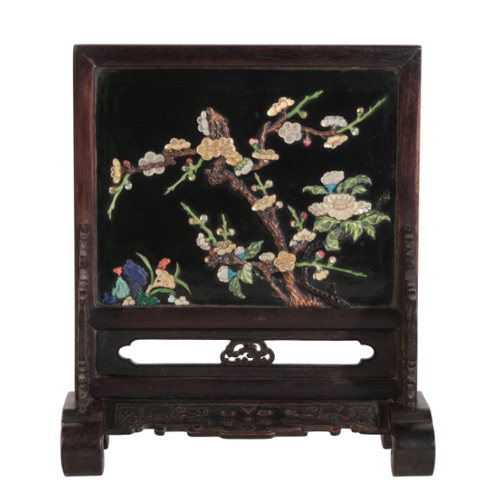 111 - A CHINESE CARVED AND LACQUERED HARDWOOD TABLE SCREEN

the stand carved in low relief with archaic mo... 