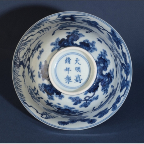 30 - A CHINESE BLUE AND WHITE BOWL

early Qing or later, with an everted rim, decorated with goats in a l... 