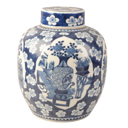 43 - A CHINESE BLUE AND WHITE PORCELAIN GINGER JAR AND COVER

in the Kangxi style, decorated with panels ... 