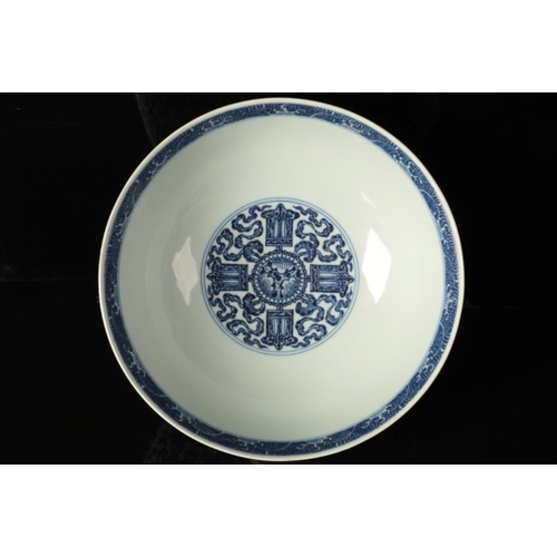 53 - A CHINESE BLUE AND WHITE BOWL

with heaped and piled decoration of lotus flowers and scrolls above a... 