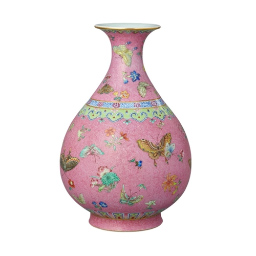 60 - A FINE CHINESE FAMILLE-ROSE PINK GROUND VASE

enamelled in polychrome with butterflies and flowers, ... 