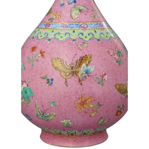 60 - A FINE CHINESE FAMILLE-ROSE PINK GROUND VASE

enamelled in polychrome with butterflies and flowers, ... 