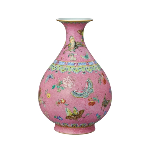 60 - A FINE CHINESE FAMILLE-ROSE PINK GROUND VASE

enamelled in polychrome with butterflies and flowers, ... 