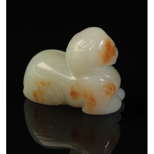 89 - A CHINESE PALE CELADON JADE KYLIN

the stone with a soft lustrous polish and rust-coloured mottling ... 