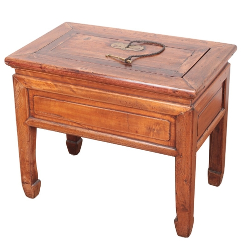 9 - A CHINESE LOW TABLE

the top with a lifting compartment, fitted with an engraved escutcheon plate, a... 