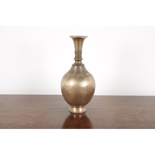 533 - A SOUTH EAST ASIAN BRONZE VASE

19th/20th century, of baluster form, 29cm high