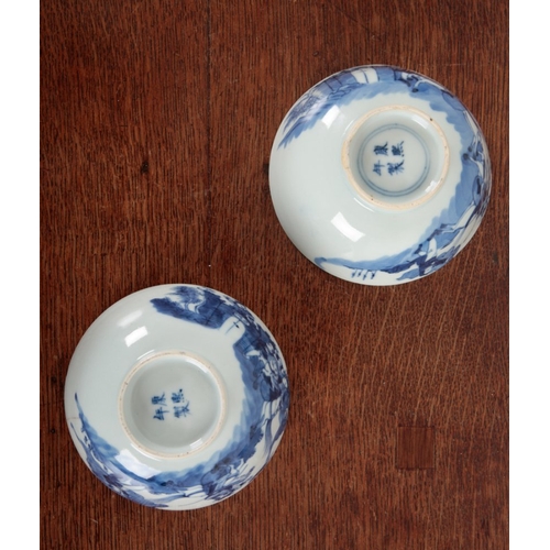 544 - TWO CHINESE BLUE AND WHITE PORCELAIN BOWLS

each bearing four character Kangxi marks to the base but... 