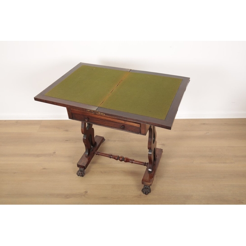 546 - A WILLIAM IV ROSEWOOD AND MARQUETRY GAMES TABLE

the hinged lid rotates to open to a baize lined sur... 