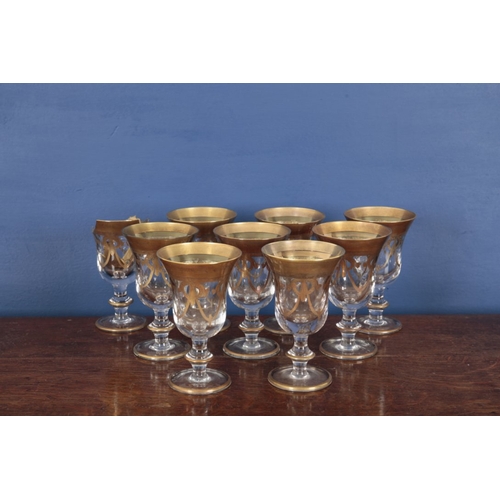 547 - A COLLECTION OF ITALIAN PARCEL GILT GLASSWARE

20th century, including nine large wine glasses, 16.5... 