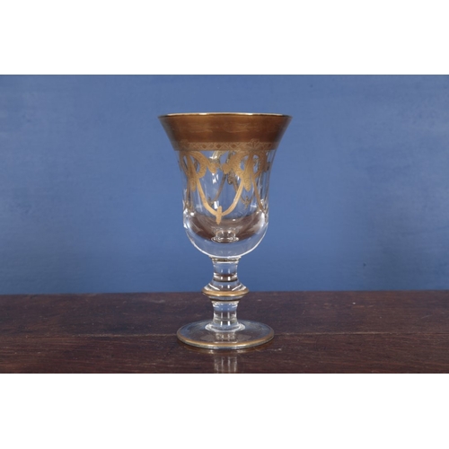 547 - A COLLECTION OF ITALIAN PARCEL GILT GLASSWARE

20th century, including nine large wine glasses, 16.5... 