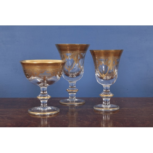 547 - A COLLECTION OF ITALIAN PARCEL GILT GLASSWARE

20th century, including nine large wine glasses, 16.5... 