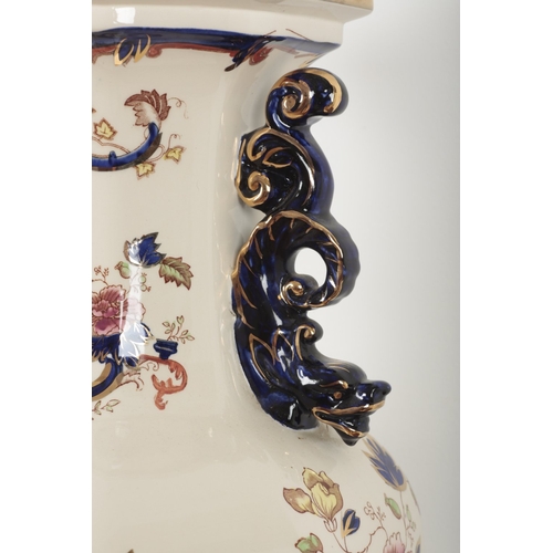 562 - A LARGE MASON'S IRONSTONE TABLE LAMP

decorated in the Imari palette, on a wooden stand, 72cm high o... 