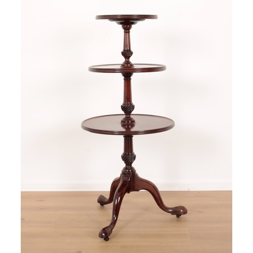 585 - A GEORGE III MAHOGANY DUMB WAITER

the three tiered levels on turned supports, with downswept cabrio... 