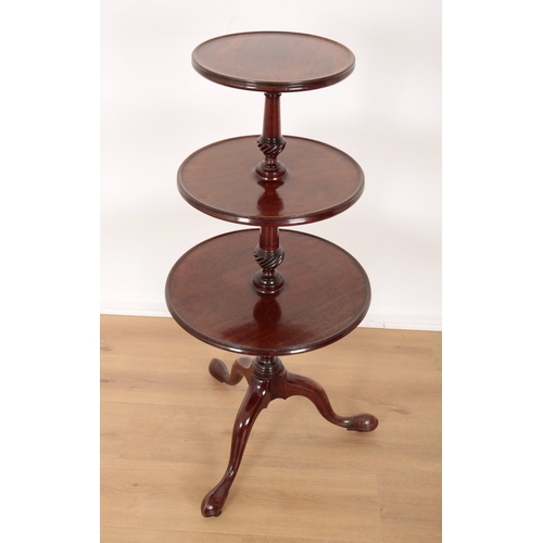 585 - A GEORGE III MAHOGANY DUMB WAITER

the three tiered levels on turned supports, with downswept cabrio... 