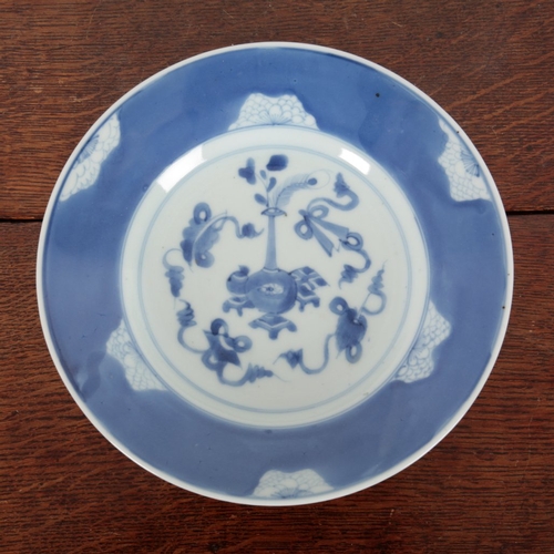 604 - TWO SIMILAR CHINESE BLUE AND WHITE PLATES

Qing dynasty, the larger with flower mark to the base, th... 