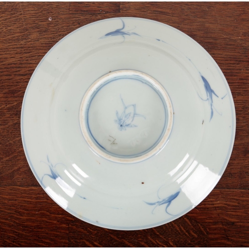 604 - TWO SIMILAR CHINESE BLUE AND WHITE PLATES

Qing dynasty, the larger with flower mark to the base, th... 