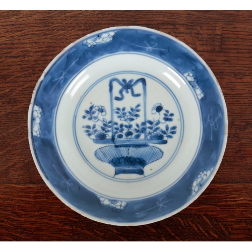 604 - TWO SIMILAR CHINESE BLUE AND WHITE PLATES

Qing dynasty, the larger with flower mark to the base, th... 