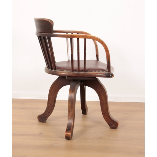 607 - AN EDWARDIAN REVOLVING DESK CHAIR

with a cushioned seat, 71cm high x 53cm wide