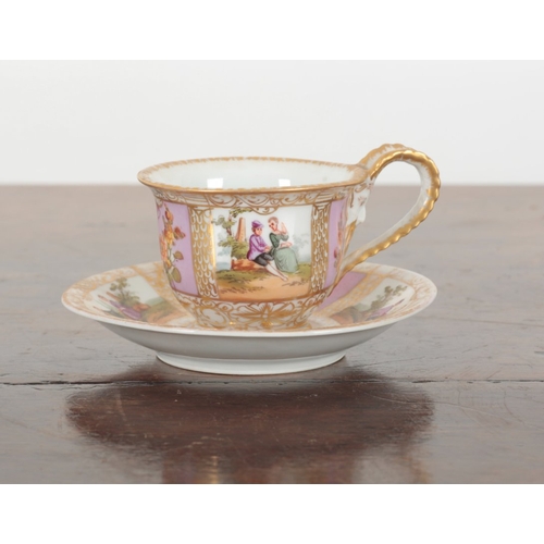 651 - A VIENNA PORCELAIN CUP AND SAUCER

19th century, marked to the base, decorated with alternating pane... 