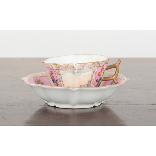 651 - A VIENNA PORCELAIN CUP AND SAUCER

19th century, marked to the base, decorated with alternating pane... 