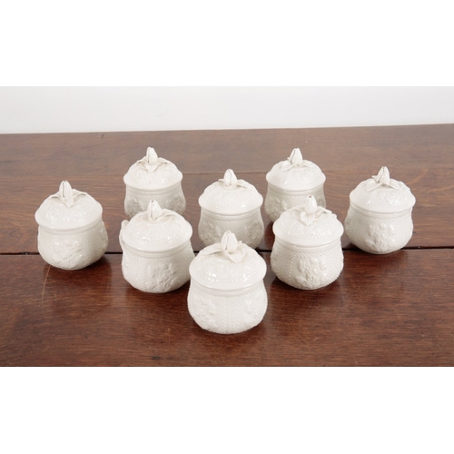 943 - A SET OF EIGHT POTTERY POT DE CREME

by Mottahedeh of Italy, after the works of the Pot aux Choux fa... 