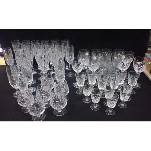 127 - A COLLECTION OF CRYSTAL DRINKING GLASSWARE mostly champagne glasses to include Edinburgh crystal