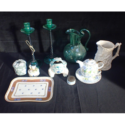 133 - A PAIR OF ARTS & CRAFTS STYLE GREEN GLASS CANDLESTICKS (one damaged) with a similar green glass jug,... 