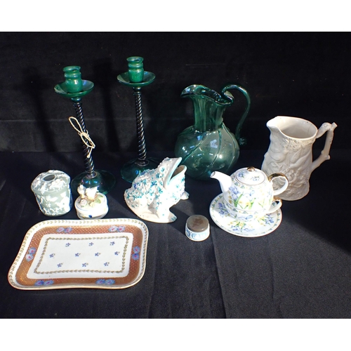 133 - A PAIR OF ARTS & CRAFTS STYLE GREEN GLASS CANDLESTICKS (one damaged) with a similar green glass jug,... 