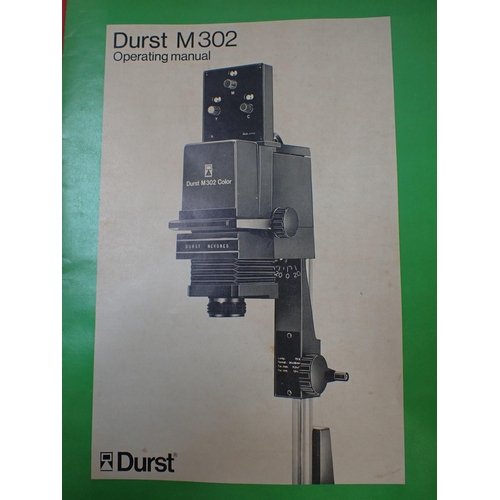 135 - A DURST M302 PHOTOGRAPHIC ENLARGER boxed with instructions, together with a Silk 88 tripod, boxed, t... 