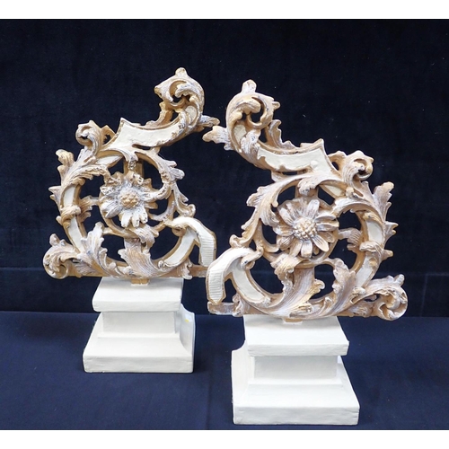 155 - A PAIR OF DECORATIVE GILTWOOD ROCOCO STYLE 'FRAGMENTS' on painted wooden bases, indistinctly marked,... 