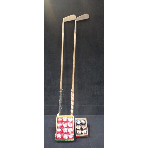 159 - TWO OLD GOLF PUTTERS, L.P. COCHRANE & Co and two boxes of Dunlop golf balls (still wrapped)