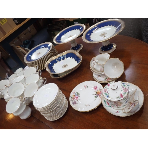 169 - A ROYAL WORCESTER 'GOLD CHANTILLY' PART DINNER SERVICE an Aynsley blue and gilt part dessert service... 