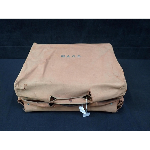 170 - A VINTAGE BROWN LEATHER SUITCASE with canvas outer cover 46 x 35 x 20cm (cover a/f)