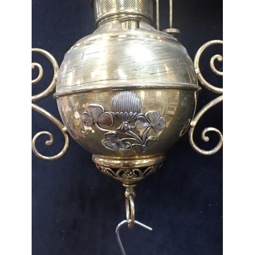 176 - A LATE 19TH CENTURY AMERICAN BRASS PENDANT OIL LAMP by Miller, the bulbous body with white metal lea... 