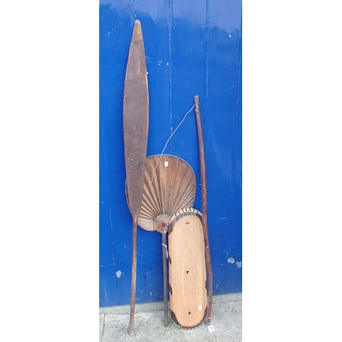 180 - A WOODEN TRIBAL SPEAR and other tribal items (4)