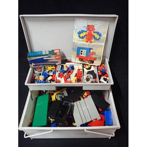 210 - A QUANTITY OF VINTAGE LEGO including an unopened box of blue rails (No.157), a yellow clockwork moto... 