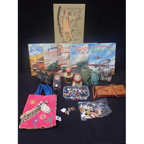 213 - A RUBBER PIG with a Russian Doll, and quantity of train childrens' books and other items