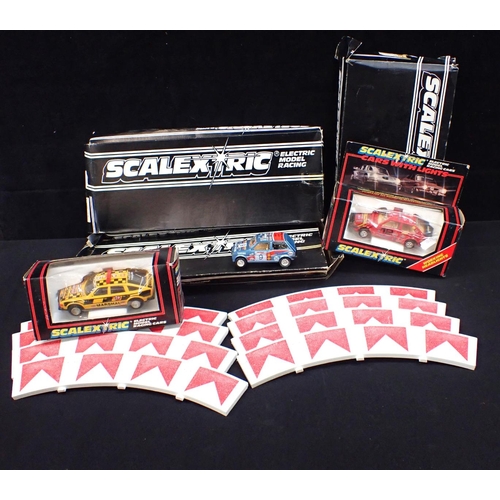 217 - SCALEXTRIC three cars, two boxed, track and accessories