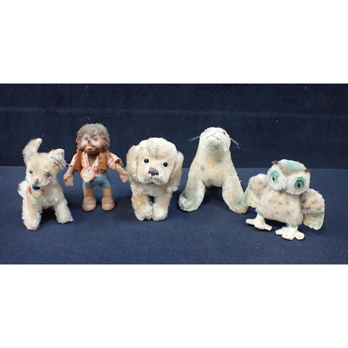 218 - A STEIFF FOX (LABELLED), A SIMILAR OWL, SEAL AND DOG (not labelled), and a Steiff 'Macki' (dirty) (5... 