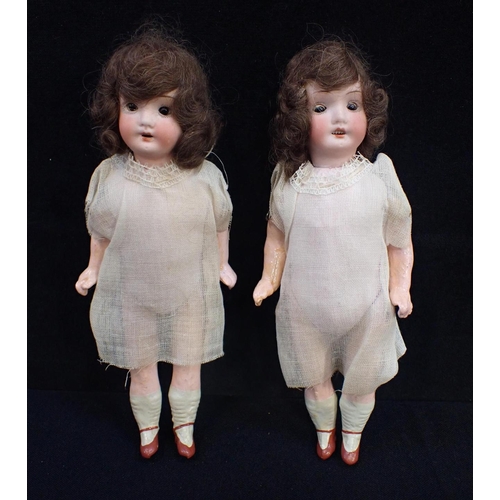 222 - TWO EARLY 20TH CENTURY GERMAN BISQUE-HEAD DOLLS with composition bodies and painted limbs, 1920s hai... 