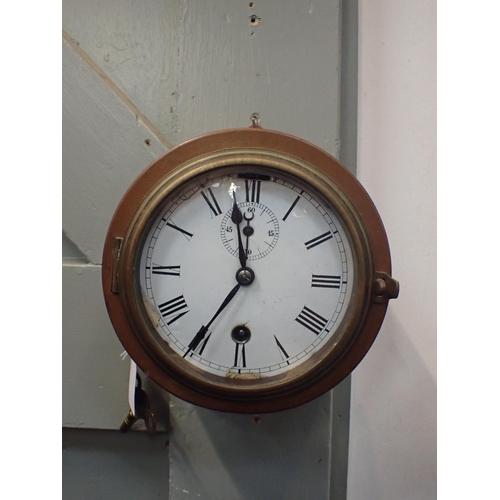 236 - A 19th CENTURY SHIP'S CLOCK with enamel dial