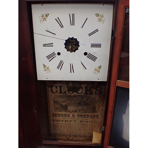 237 - AN AMERICAN MAHOGANY 'OG' WALL CLOCK BY JEROME & CO with white painted dial, 66cm high (in poor cond... 