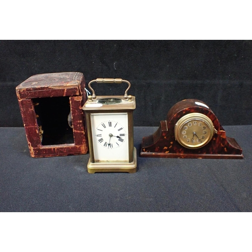 243 - A BRASS CARRIAGE CLOCK, STRIKING ON A GONG 15cm high, handle up,with leather outer case (runs, no ke... 