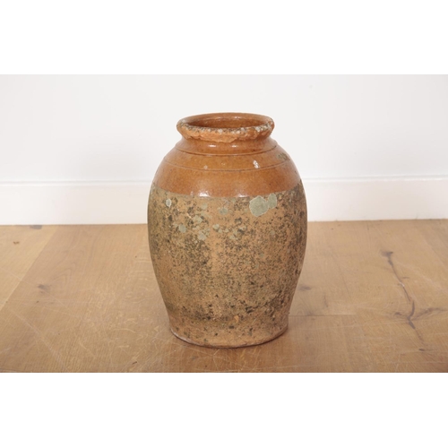 25 - A TERRACOTTA JAR with treacle glazed shoulders, 40cm high