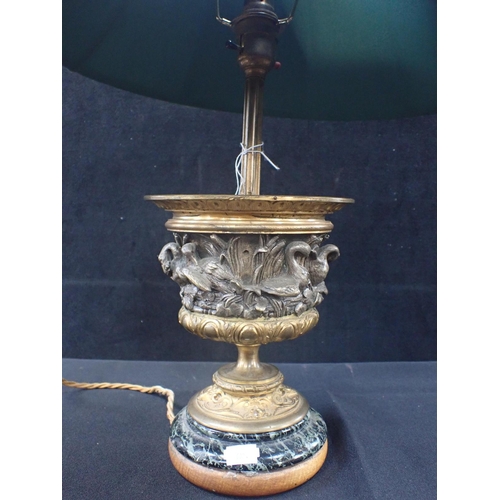 251 - AN ORMOLU TABLE LAMP, OF URN FORM on marble base, with frieze cast with swans amongst bulrushes (for... 