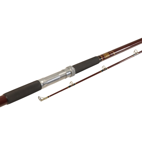 27 - HARDY BROS: A TOURNEY BEACHCASTER TWO PIECE CARBON ROD in the original Hardy canvas rod bag