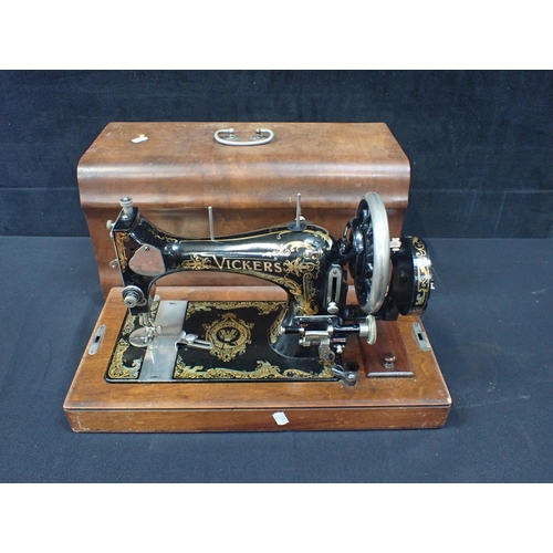 28 - A VINTAGE VICKERS 'VIBRATING SHUTTLE' SEWING MACHINE, ATTACHED BOBBIN WINDER with japanned decoratio... 